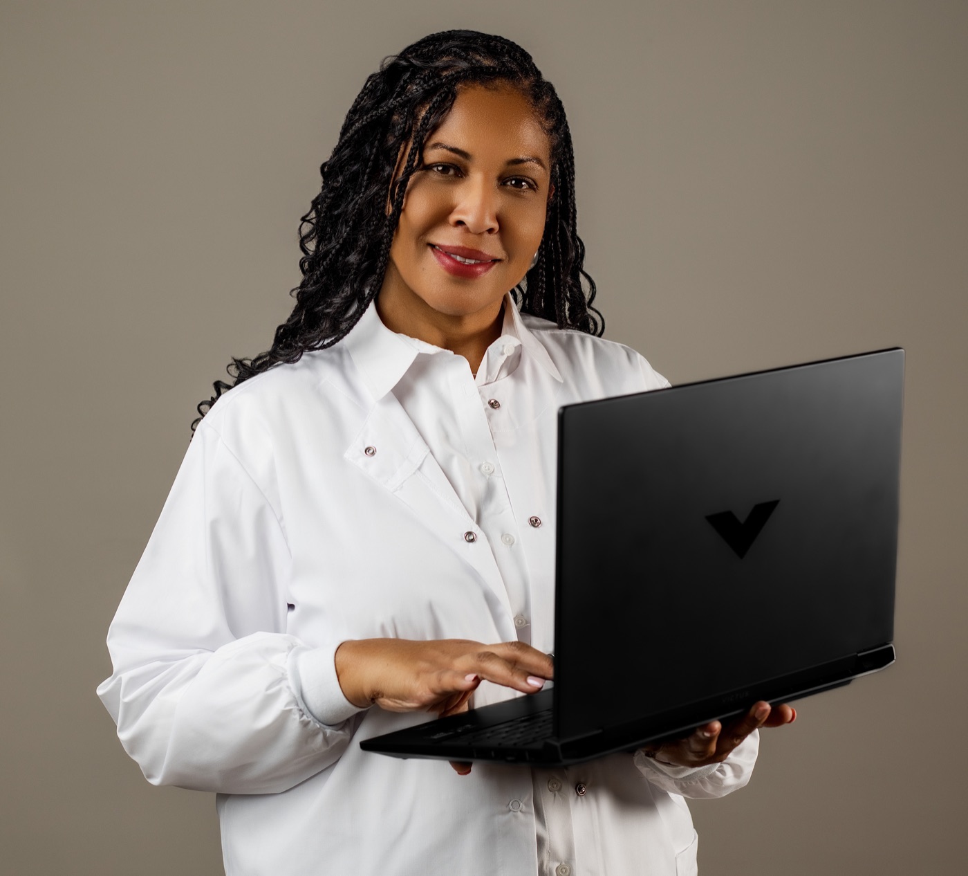 Brenda M. Williams, MS, RDN, working on a laptop